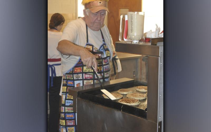 Volunteer Ron Williams made sure there was enough pancakes to go around during the Epworth Community Club’s Pancake Breakfast Saturday, July 3.