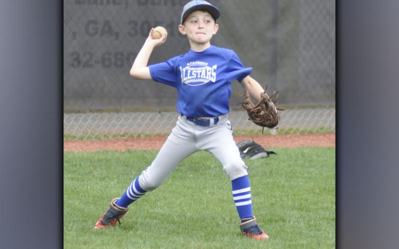 Bentlee Cole dials in his accuracy during the Pitchers and Catchers Camp Wednesday, July 7. The camp was hosted by the Fannin County High School baseball team, and all proceeds went to the team.