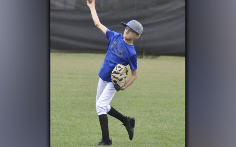 Carson Callihan uncorks a pitch. He was showing off his skills when the Fannin County High School baseball team hosted a recent camp.