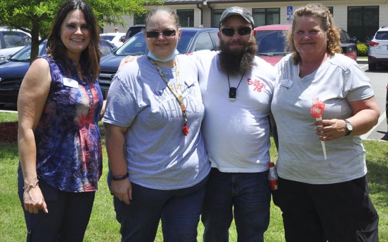 Shown enjoying the festivities at Blue Ridge Assisted Living and Memory Care Friday, July 2, are, from left, Cheryl Rainbow, Jamie Robinson, Jeremiah Robinson and Rose Chadwick.