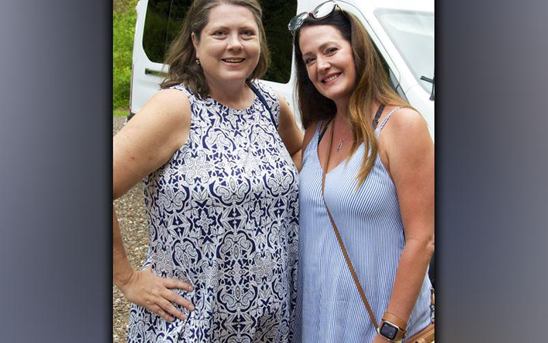 Tiffany Towery, left, and Carla Pack were all smiles as they entered the first-ever Paws for Celebration fundraiser for the Humane Society of Blue Ridge Saturday, July 17.