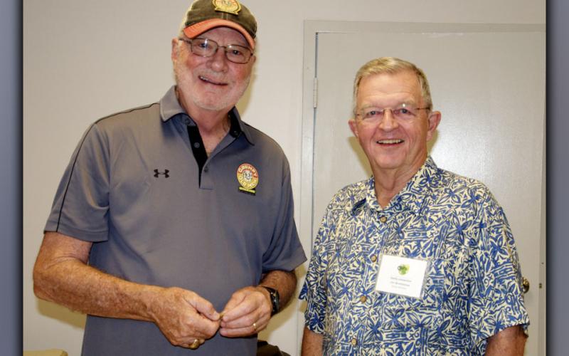 Dale Greene with the Marine Corp League Detachment #1438, left, and Fannin County Family Connection Board of Directors member Jim Brumbelow keep each other company.
