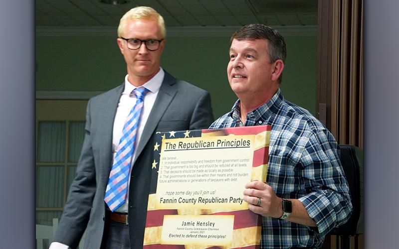 Fannin County Commission Chairman Jamie Hensley was recognized for his contribution to the Republican Party during a Fannin County Republican Party meeting Monday, July 19. Hensley, right, stands beside Fannin County Republican Party Chairman Frank Wood, who presented Hensley a plaque honoring his efforts.