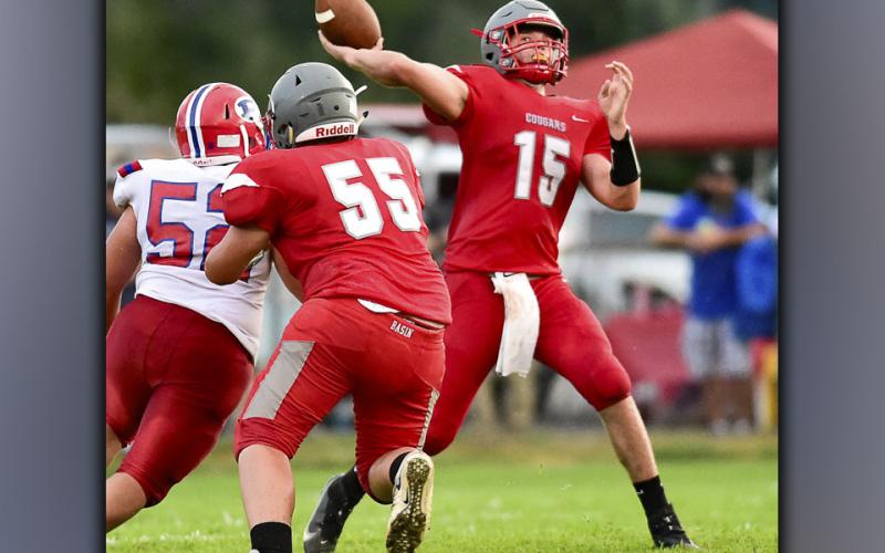 Copper Basin quarterback Joe Boggs uncorks a throw during the Cougars game against Polk County Friday, August 20.