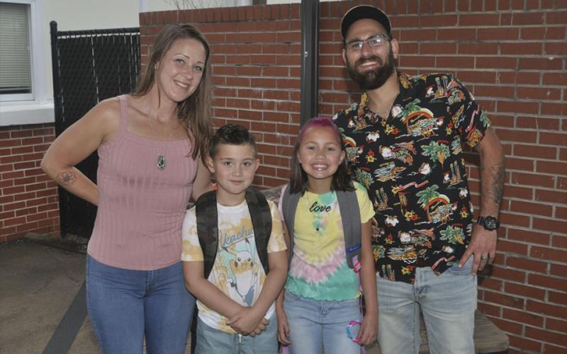West Fannin Elementary School started the first day of the 2021-2022 school year Friday, July 30. Emily and Josh Hawkins were there to help their children, Jonesy (front left) and Aeria, to their first classes.