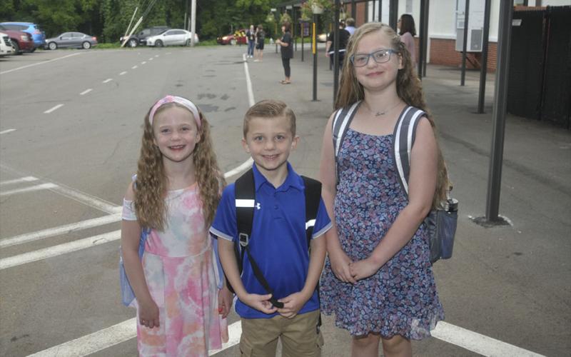 Kids were eager to get to their class and start the semester at West Fannin Elementary School Friday, July 30. Shown are, from left, Eliza Carroll, Liam Carroll and Sophia Carroll.