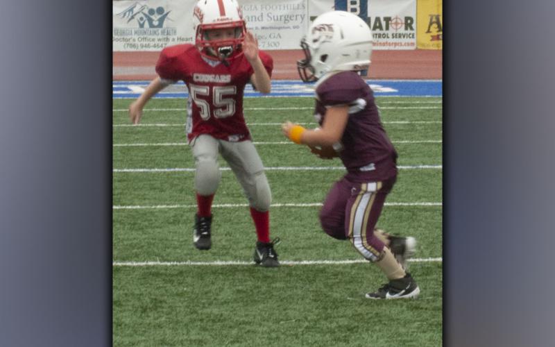 Nolan Lisk (55) chases down a ball carrier for Copper Basin during the football jamboree at Fannin County Saturday, August 21.