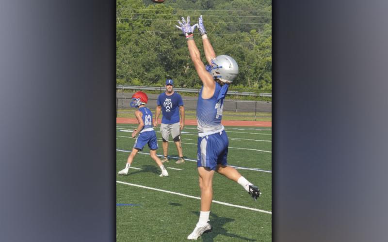 Cooper Born hauls in a catch during the Fannin County Rebels football practice Thursday, July 29.