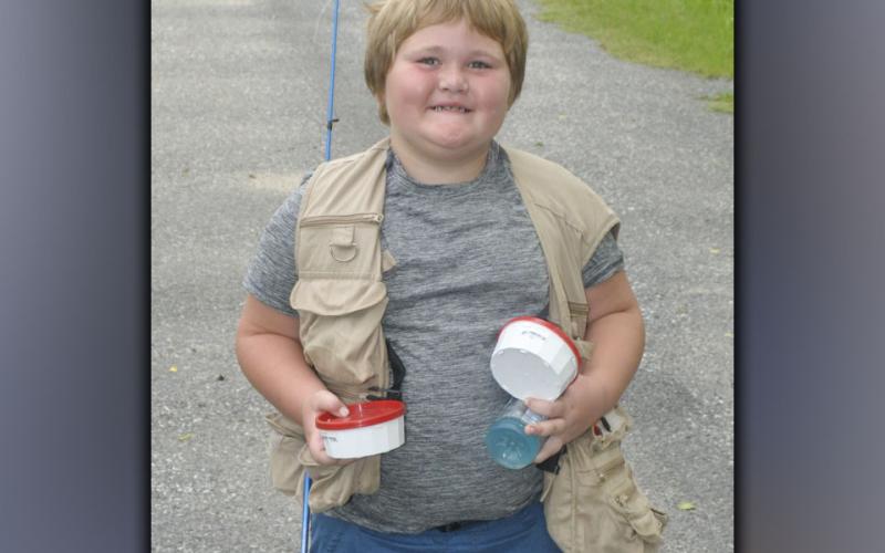 Mason Ross was ready to go fishing during the fishing camp hosted by the Fannin County Recreation Department Wednesday, July 28.