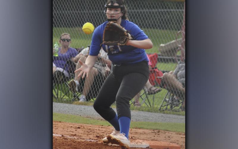 First baseman Rachel Adams catches a ball and gets a Gilmer runner out during the Lady Rebels preseason scrimmage against Gilmer County Thursday, August 5.