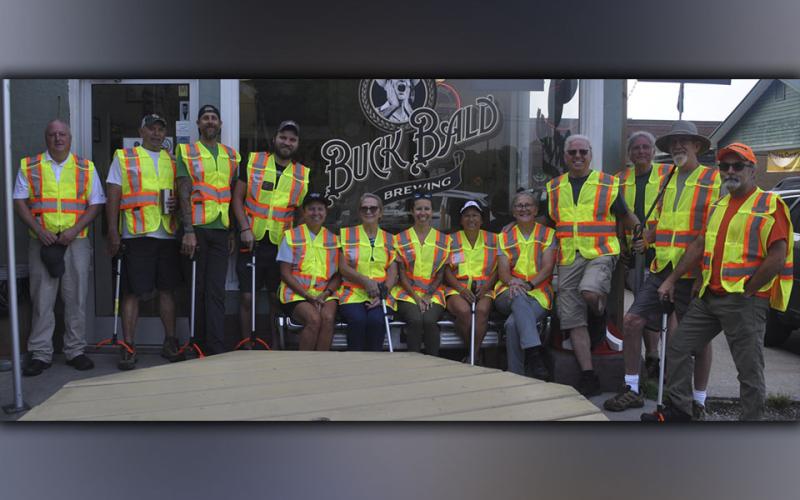 The Buck Bald Beautification Brigade gathered together to pick-up trash along Highway 68 in Copperhill Wednesday, August 4. Shown, from left, are Tennessee Litter Grant Director for Polk County William Wallace, Ray Aballo, Matt Wright, Jake Reuse, Mary Langford, Jeanne Marie Crosier, Sarah Wright, Courtney Castro, Karen Herring, Mike Herring, Walter Smith, Ross DeLoach and Kevin McCarty.