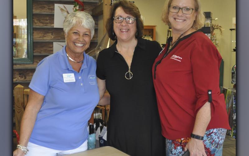 The Fannin County Chamber of Commerce held their Business After Hours event Tuesday, August 24, at the Blue Ridge Bird Seed Company, which is located at 611 East Main Street, and Danielle’s Cafe, which is located next door, provided the food and drinks. Shown greeting guests are, from left, chamber Director of Membership Services Dianne Mallernee, Brenda Morgan and Shelley Eyerly.