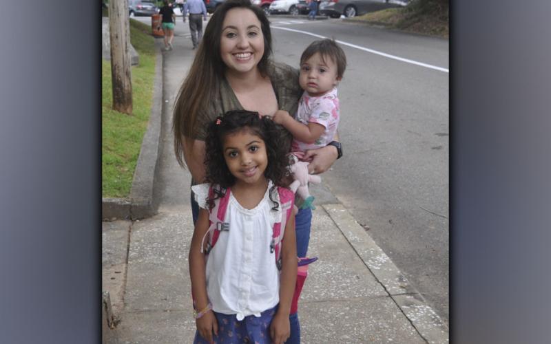Shown on the first day of school at Blue Ridge Elementary School Friday, July 30, are, clockwise, first grader Peyton Neal, her mother Whitney Neal, and little sister Harper Neal.