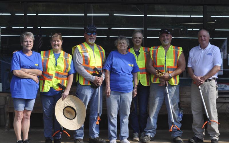 Citizens of Turtletown came together to clean up trash along Runion Road in Turtletown Saturday, July 24. Standing outside the Kickstart Convenience Store on Highway 68, are, from left, Mel Taylor, owner of Kickstart Convenience Store Dee Dee Deal, Jeff Thomason, Yvonne Veal, Patty Freeman, Ronney Freeman and Tennessee Litter Grant Director for Polk County William Wallace.