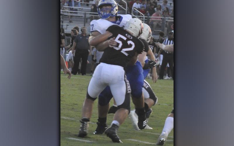 Corbin Davenport (8) hauls in a tough catch during Fannin’s game against the Sonoraville Phoenix Friday, September 3.