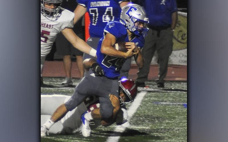 Khole Green (24) fights for extra yards in recent action for the Fannin County Rebel football team.