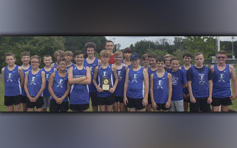 The Fannin County Middle School Rebel cross country team has had a strong showing so far this season. Shown after the Muphy Bulldog 2021 XC Open are, from left, front row, Logan Long, Ryan Wood, Reed Puckett, Cayde Cantrell, Finn Thoresen, Castle Barnett, Garrett Pittman, Mason Sandefur, Jayce Gillis and Hunter Pierce; middle row, Alex Hughes, Ethan Owensby, Rylin Davis, Conner Kyle, Jonathan Jones, Cason Mitchell, Manning Sandefur and Henry Schueneman; and back, Aiden Jones, River Stuart, Austin Prieto and