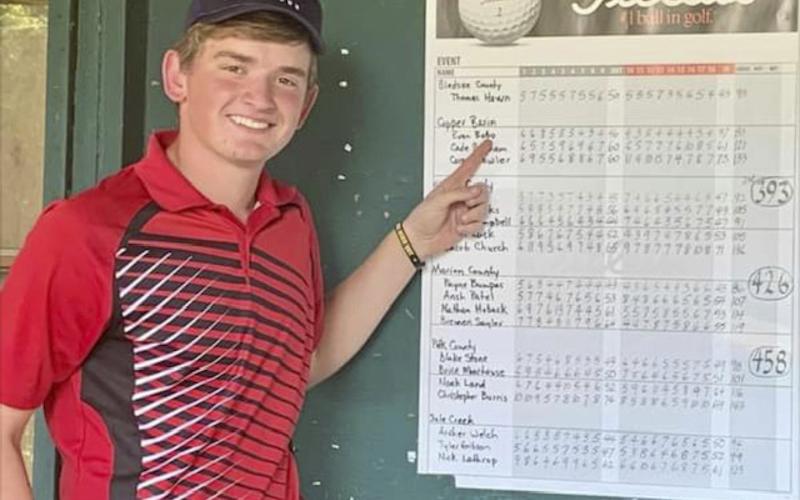 Evan Bobo is shown pointing at his region tournament score that punched his ticket to the state tournament. Bobo is set to play in Sevierville, Tennessee, October 6 through 8.