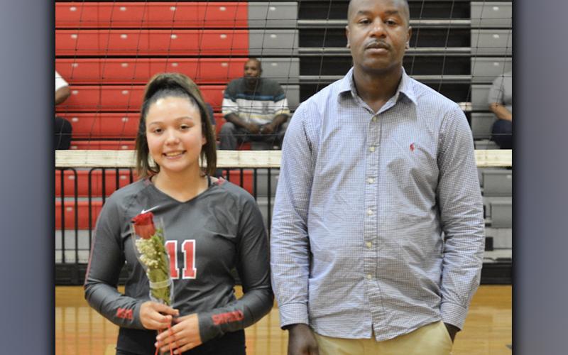 Lady Cougar volleyball senior Aliah Lunsford was honored during the last Copper Basin Lady Cougars volleyball game of the season Thursday, September 23. Lunsford is shown during the ceremony with her father, Michael Barber.