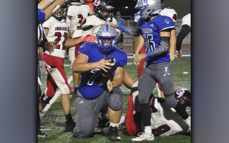 Logan Long (77) comes up with a fumble in a big moment to give the Rebels the ball back during Fannin’s football game against Chattooga Friday, October 22.