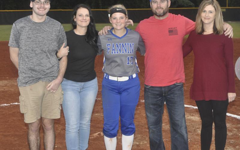 Riley Davis was one of three senior Lady Rebel softball players honored during the last home game of the season Tuesday, October 5. Shown are, from left, Tristen Davis, brother; Tanya Davis, mother; senior Davis; Vernon Davis, father; and Lanita Rogers.