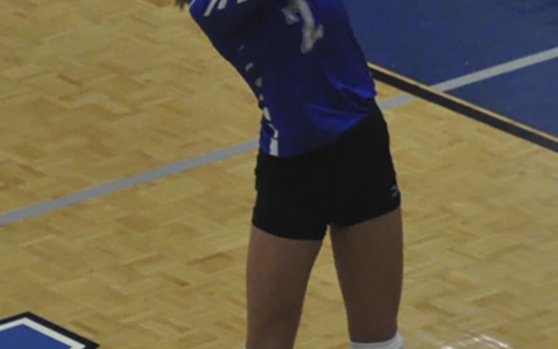 Lady Rebel Reigan O’Neal keeps a volley alive in recent action for the Lady Rebels volleyball team.