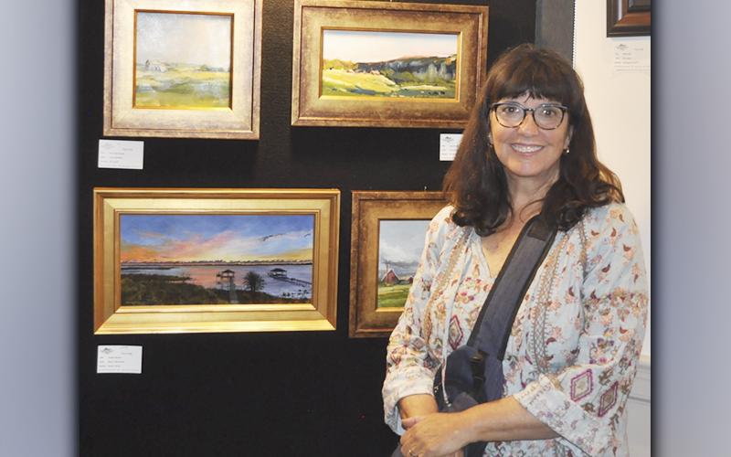 The Blue Ridge Mountains Arts Association hosted the Southern Appalachian Artist Guild’s  (SAAG) Autumn Member Show award ceremony and opening reception Saturday, October 16. Joanne McNally, of Blue Ridge, took home first place in the 2D Category for her oil on canvas piece titled “Long Shadow.”