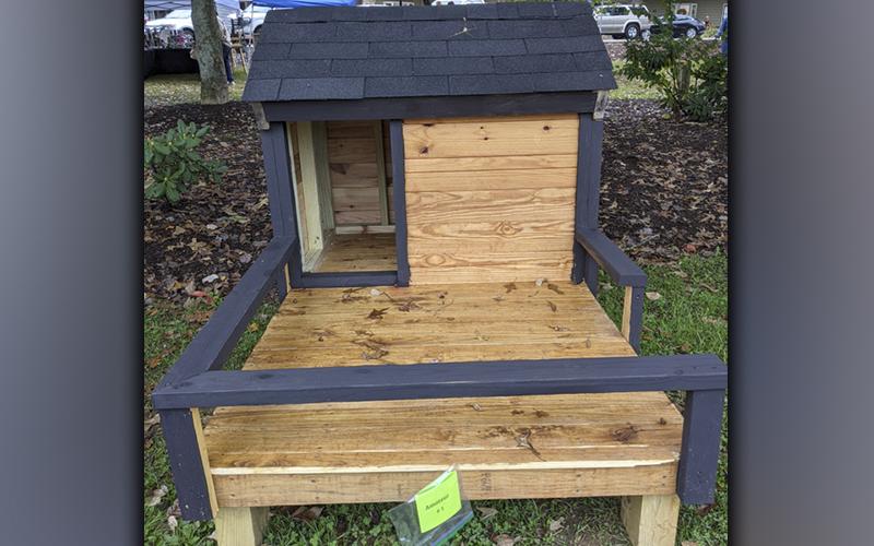 Paws in the Park guests were invited to vote for their favorite dog houses at the Freedom for Fido booth Saturday, October 16. Dog houses were presented anonymously in two categories: professional and amateur. The doghouse submitted by Fannin County High School wood shop students took first place out of three in the amateur category.