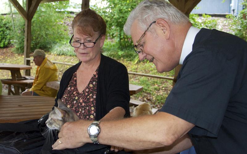 Reverend Ron Wikander says a prayer for Diane Bewes’ cat during Saint Francis’ Animal Blessing at Saint Luke’s Episcopal Church in Blue Ridge Sunday, October 3.