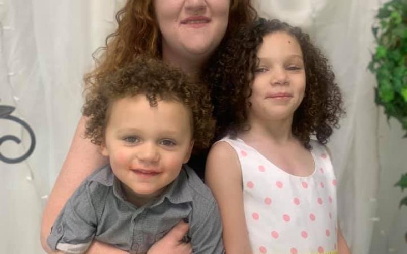 Habitat for Humanity of Fannin &amp; Gilmer Counties home recipient Ashley Gibson, who lost her home in a fire, is shown with her children Anson and Emberlin.