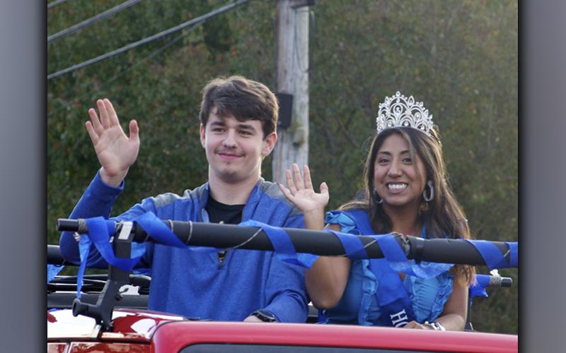 Reigning 2020 Fannin County High School Homecoming King Tommy Ledford and Queen Samantha Rosas wave to a crowd during a Homecoming Parade Thursday, October 21, to get the community excited for the homecoming game.