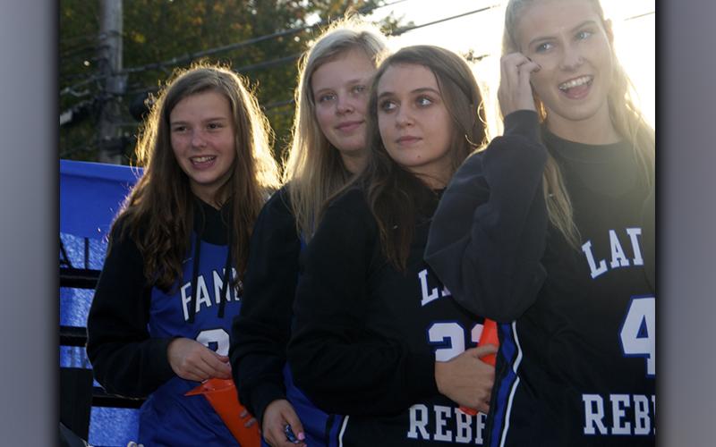 Fannin County High School Lady Rebel basketball players Macy Hawkins, Emma Holloway, Riley Reeves and Ellie Cook, from left, were all smiles during the high school’s Homecoming Parade Thursday, October 21.