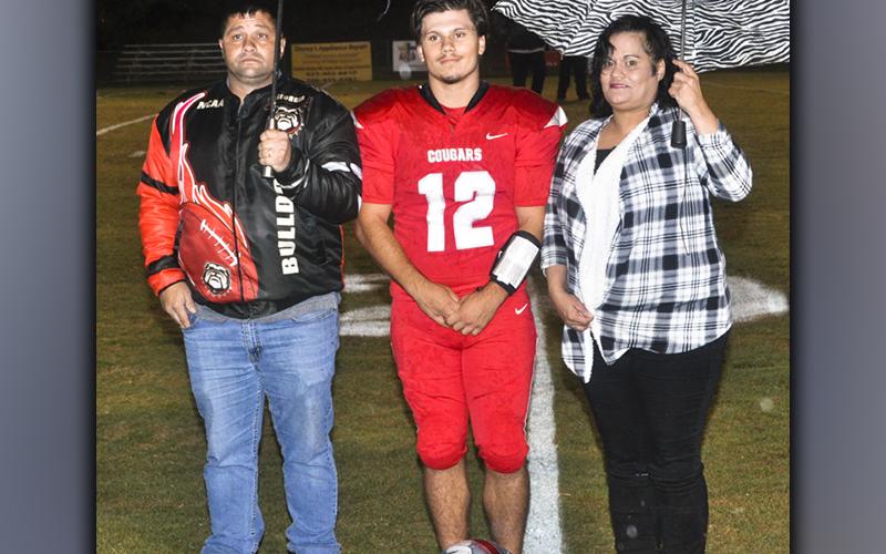 Copper Basin football senior Sebastian Baliles was recognized with the other football, band, cheer and golf seniors at Copper Basin’s senior night ceremony Friday, October 29. Baliles is shown with his parents Maribel Estramera and Aaron Baliles.