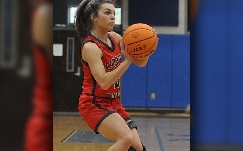 Syndey Hickey lines up a three point basket during the Lady Cougars game against Gilmer County Tuesday, November 23.