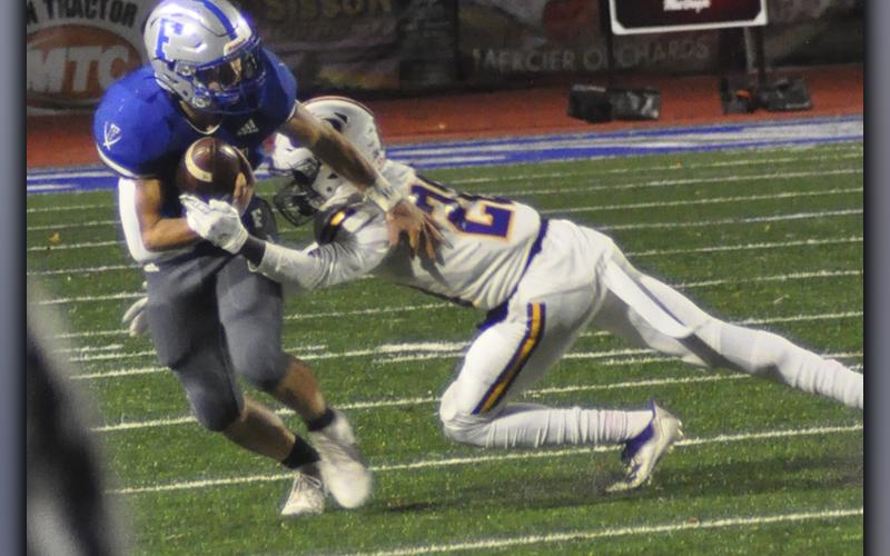 Corbin Davenport (8) sheds a tackle for a big gain during the Rebels home playoff game against Fitzgerald in the sweet sixteen round of the Georgia High School Association’s State Playoffs.