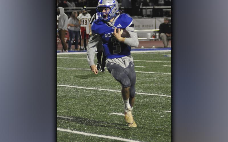 David Mashburn breaks off a big gain in recent action for the Fannin County Rebel football team.