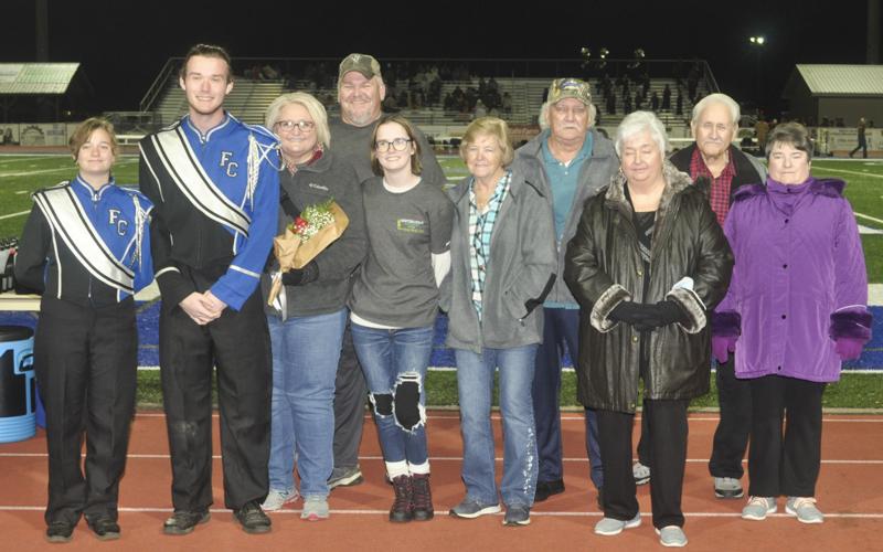 Fannin County High School band senior Will Watkins was recognized along with the other band seniors Friday, November 5, at Fannin’s last home football game of the regular season. Among well wishers include, from left, Kara Blake, senior Will Watkins, Renee Watkins, Mike Watkins, Babara Watkins, Ernest Watkins, Lola Farmer, Charlie Farmer and Michelle Farmer.