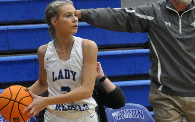 Ellie Cook looks to pass to a cutting Lady Rebel basketball player during Fannin’s game against Gilmer County Monday, November 22.