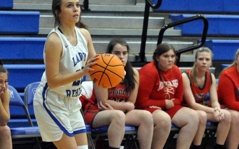 Riley Reeves knocks down a three point basket in the Lady Rebels win against Copper Basin in the first night of the ETC tip off Tournament Saturday, November 20.