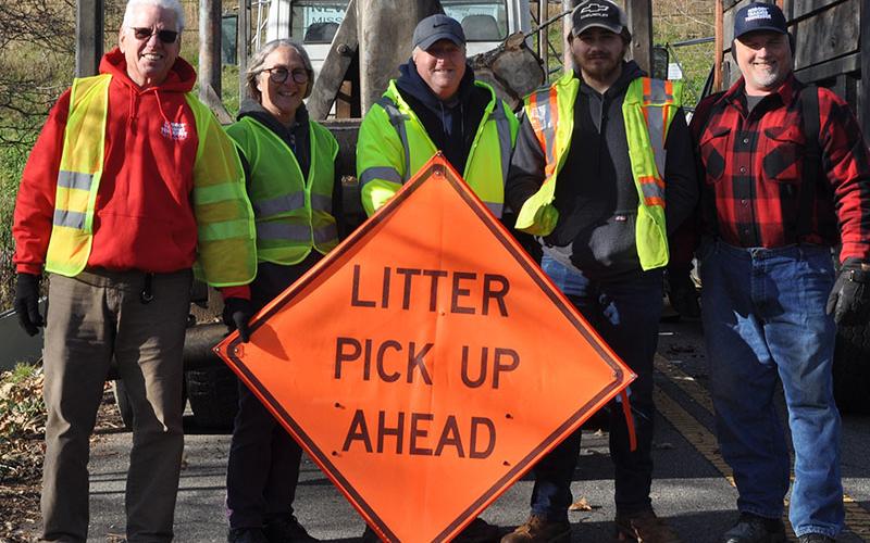 Citizens from Turtletown and Farner came together Saturday, November 20, to help remove a large mound of metal and trash that had been piling up for years along Waller Road in Farner. Shown are, from left, Mike and Karen Herring, Tennessee Litter Grant Director for Polk County William Wallace, Zeke Brendle and Ronney Freeman.