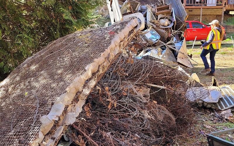 Shown is the final result of the large mound of metal and trash, which was estimated to weigh 7,670 pounds, that was collected along Waller Road in Farner Saturday, November 20.