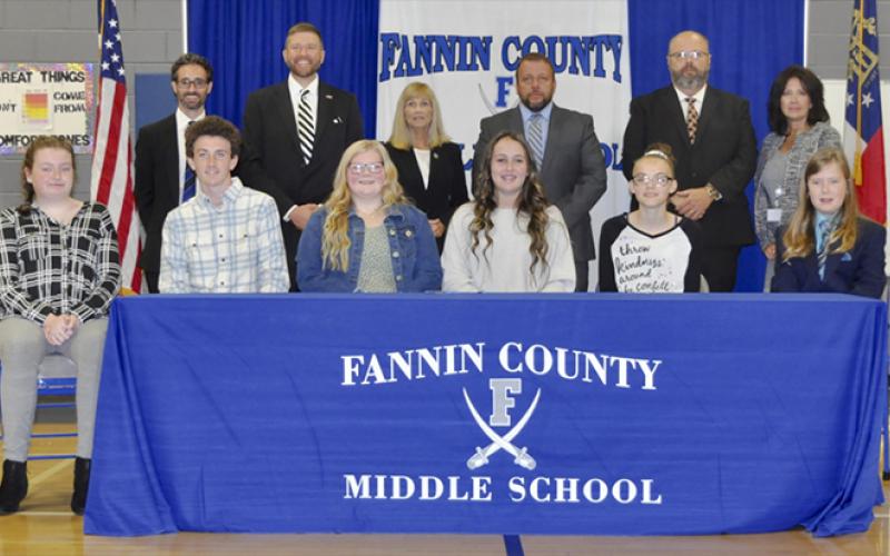Six Fannin County Middle School eighth grade students became Realizing Educational Achievement Can Happen (REACH) scholars during a contract signing ceremony Wednesday, October 27.