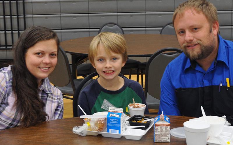 Fourth grader Tyler Jarrett, middle, got to enjoy a Thanksgiving lunch with his parents, Julie and Josh Jarrett at West Fannin Elementary School Thursday, November 18.