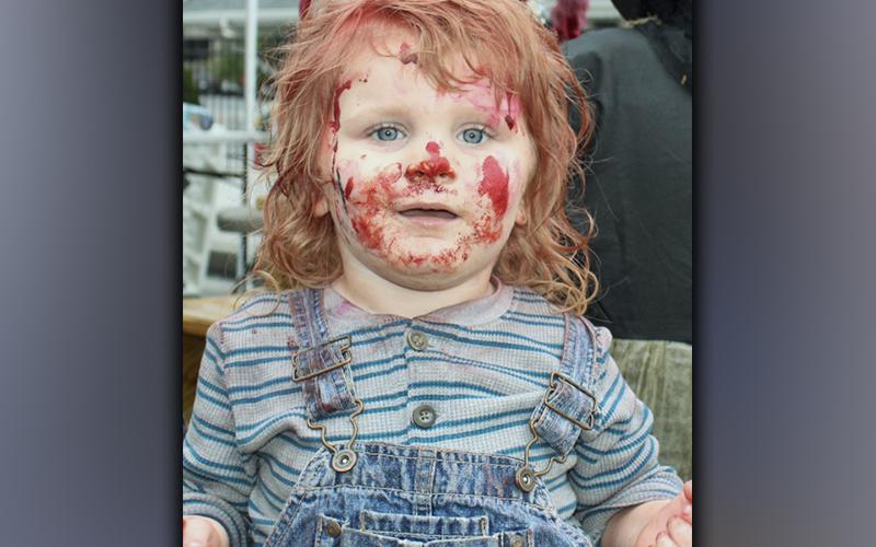 RIGHT: Landen Eabs as Chucky won first place in the infant to two years old category at the Blue Ridge Halloween Safe Zone costume contest Saturday, October 30.