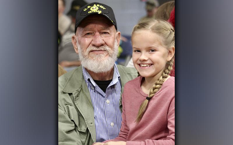 Second grader Sadie Henson celebrated her grandfather, Army veteran Tommy Henson, at Blue Ridge Elementary School’s Veterans Day ceremony.