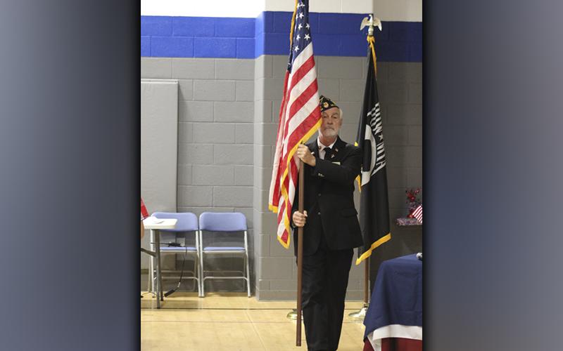 North Georgia Honor Guard member Steve Strickland proudly retires the Colors at the end of Blue Ridge Elementary School’s Veterans Day ceremony Wednesday, November 10.
