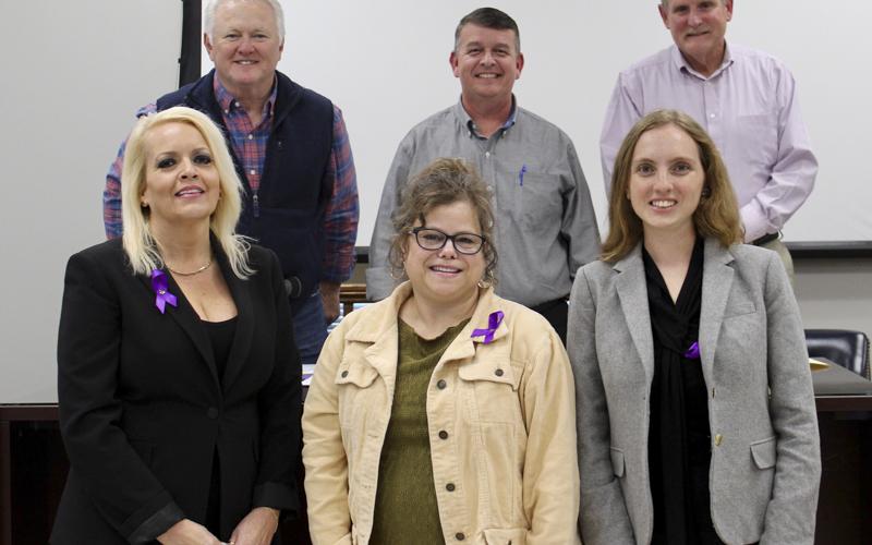 Fannin County Board of Commissioners proclaimed October as Domestic Violence Awareness month in Fannin County and urged citizens to support the North Georgia Mountain Crisis Network (NGMCN) in their efforts to end domestic violence. Shown are, from left, front row, NGMCN Board Member Michelle Swim, NGMCN Executive Director Kimberly O’Neal. NGMCN Legal Advocate Kellan Monroe; and back row, Post One Commissioner Johnny Scearce, board Chairman Jamie Hensley and Post Two Commissioner Glenn Patterson.