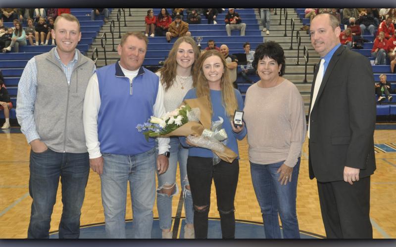 Lainey Panter was awarded her Georgia High School Association (GHSA) 2021 Class 2AA State Championship ring, Saturday, November 20. Panter was a dominant golfer during her time with the Fannin County Lady Rebels golf team. Panter was recognized in between the Fannin County and Copper Basin basketball games on the first night of the ETC Tournament. Shown with Panter are, from left, Austin Panter, brother; Kevin Panter, father; Abby Ledford; state champion Panter; Loraine Panter, mother; and Bryan Richerson.