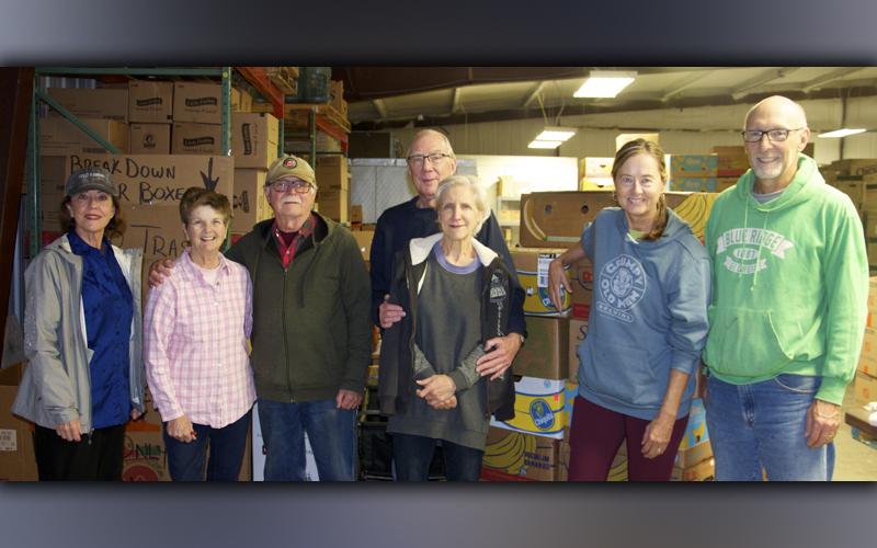 Feed Fannin volunteers, from left, Kathy Beck, Priscilla Cashman, Ron Ciochon, Glenn and Lynda Chambers, and Robin and Larry Fry helped fill boxes to be distributed for Meals on Wheels Friday, October 29.