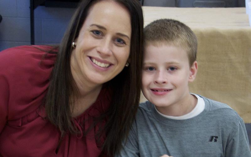 Sarah and Aiden Owensby enjoy a Thanksgiving lunch together at Blue Ridge Elementary School Wednesday, November 17.